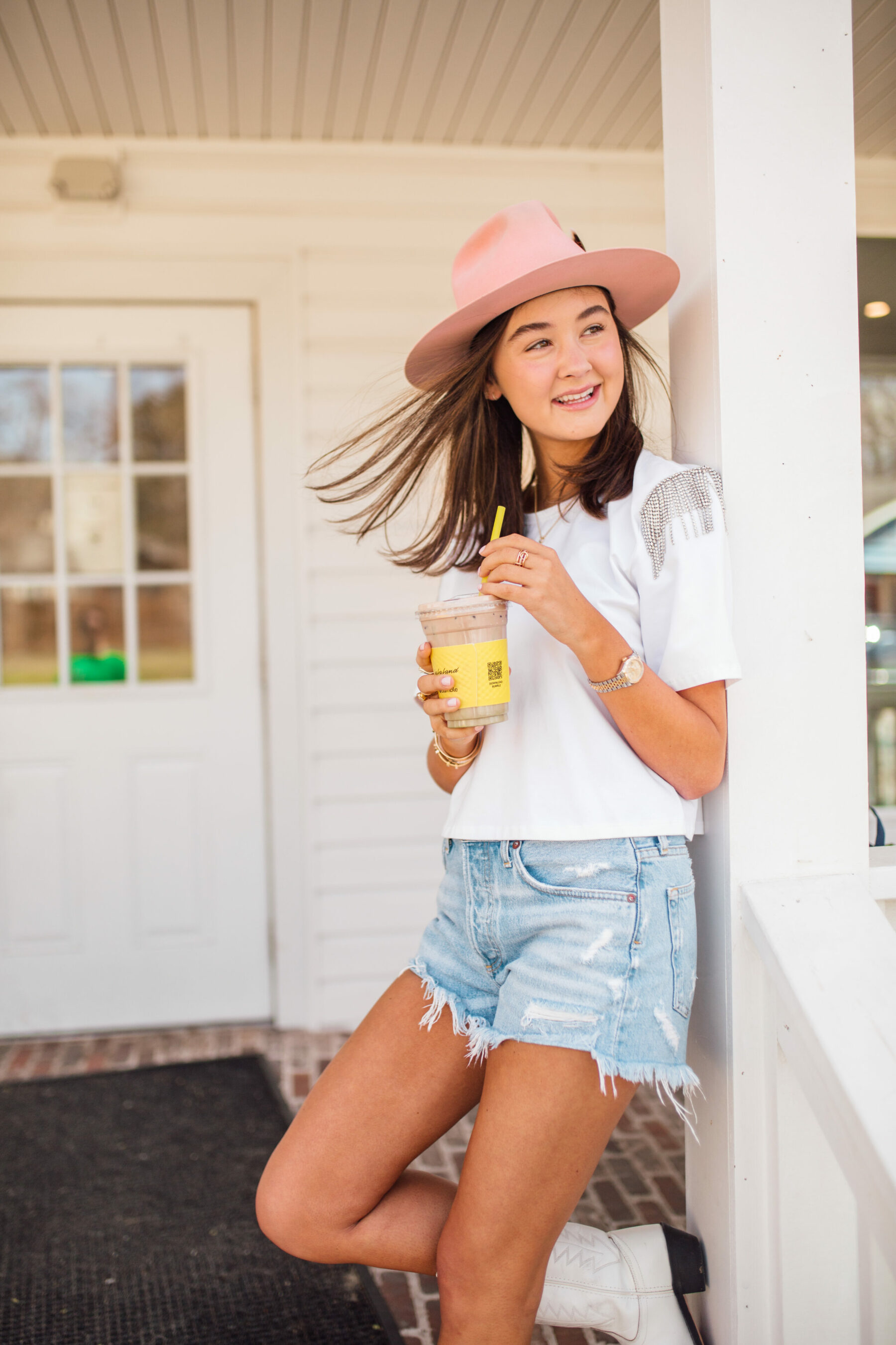 Cowgirl with shorts and boots hotsell