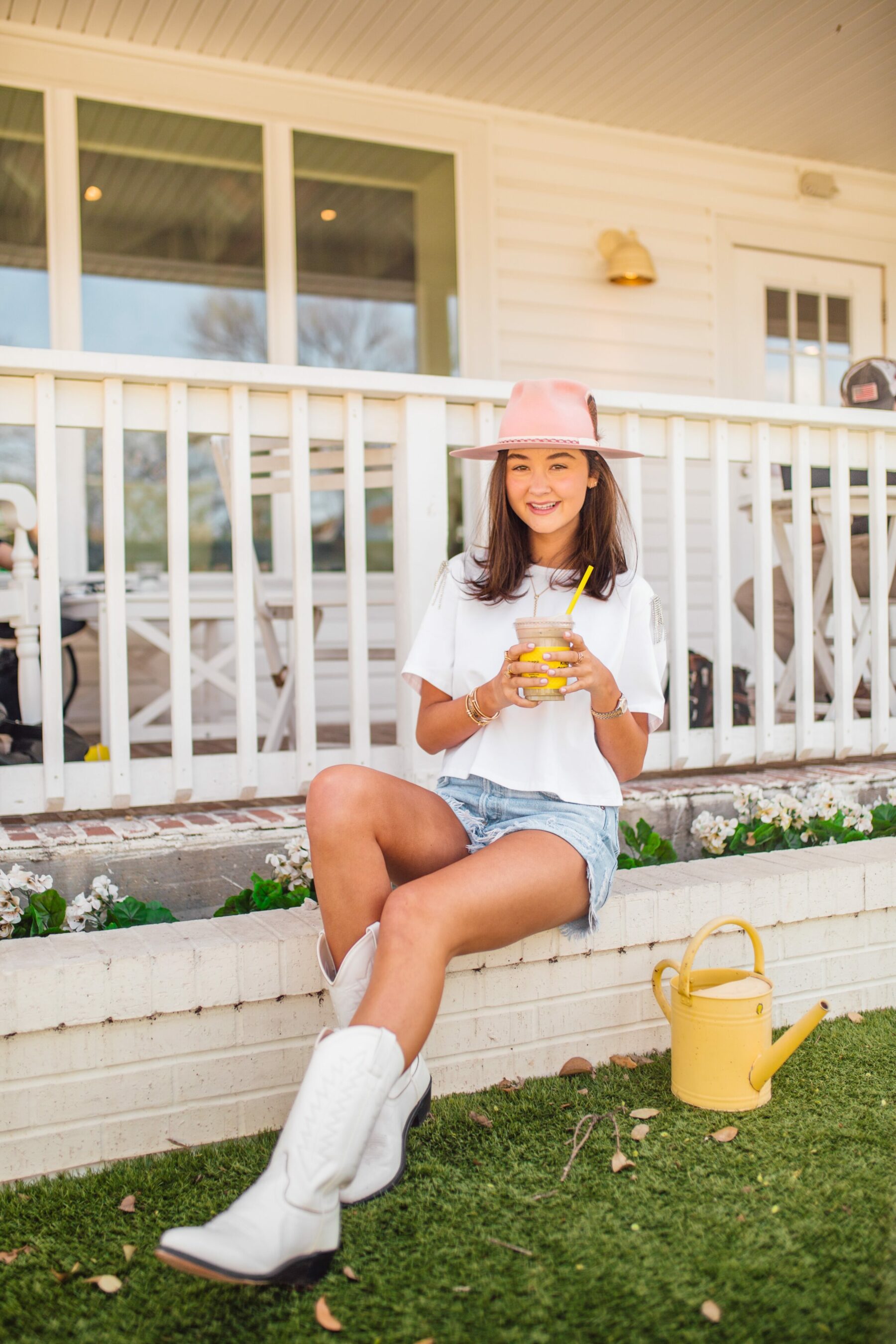 Shorts and cowboy store boots